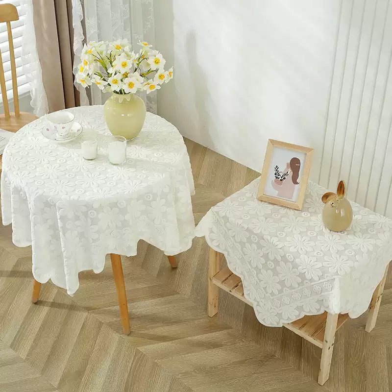 White daisy lace tablecloth on round and square tables